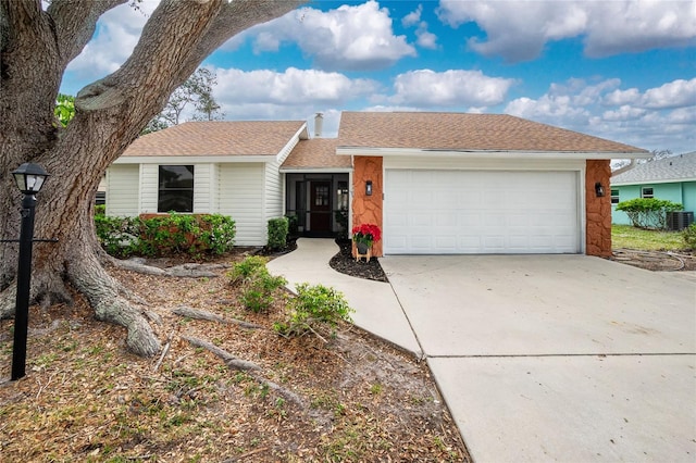 ranch-style house featuring a garage