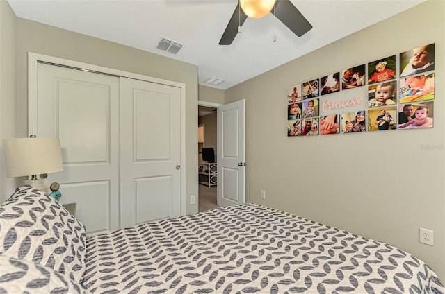 bedroom featuring carpet flooring, ceiling fan, and a closet