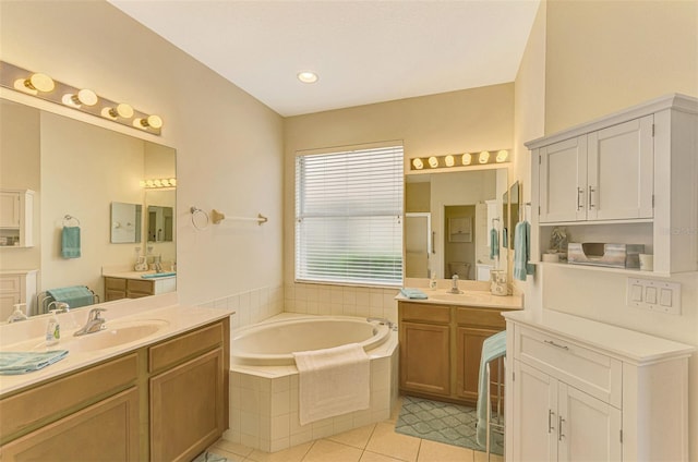 bathroom with tile patterned flooring, vanity, and independent shower and bath