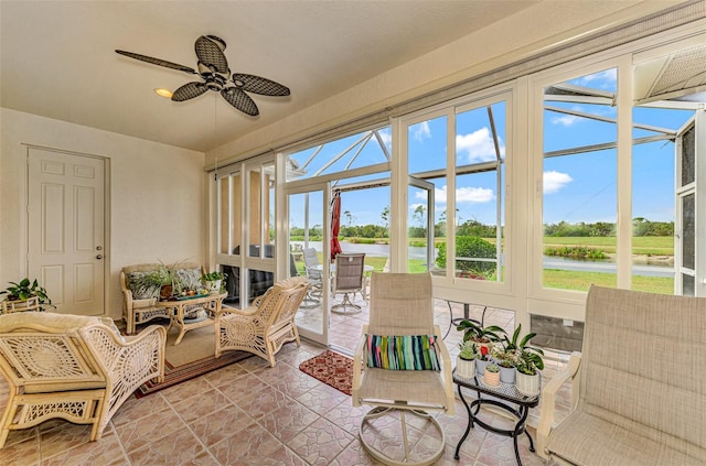 sunroom / solarium with ceiling fan