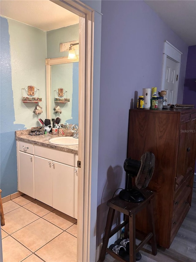 bathroom featuring tile patterned floors and vanity