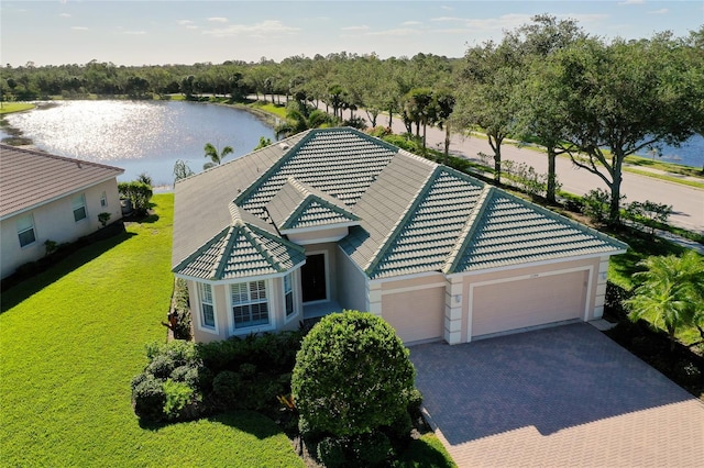 drone / aerial view featuring a water view