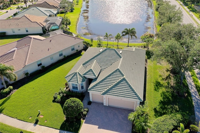 bird's eye view with a water view