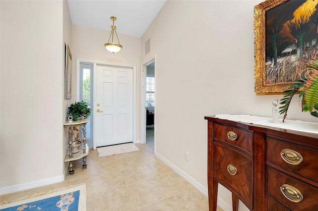 view of tiled foyer entrance