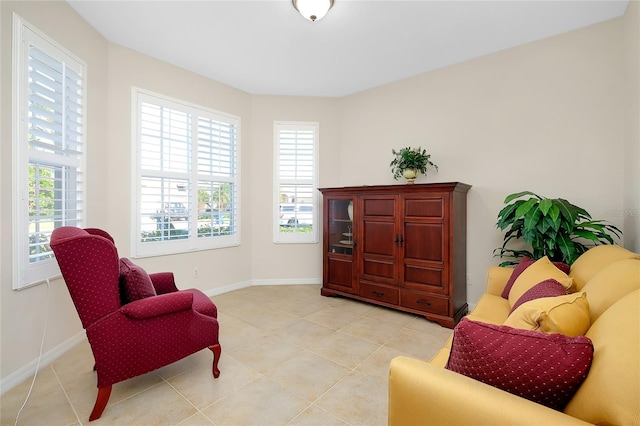 living area featuring light tile patterned flooring