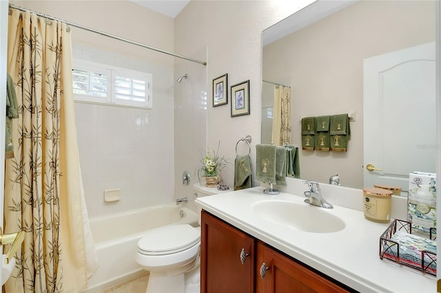 full bathroom featuring vanity, shower / bath combo, and toilet