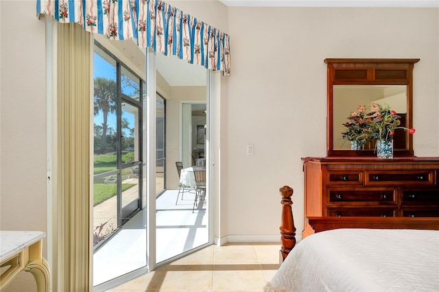 tiled bedroom with access to outside