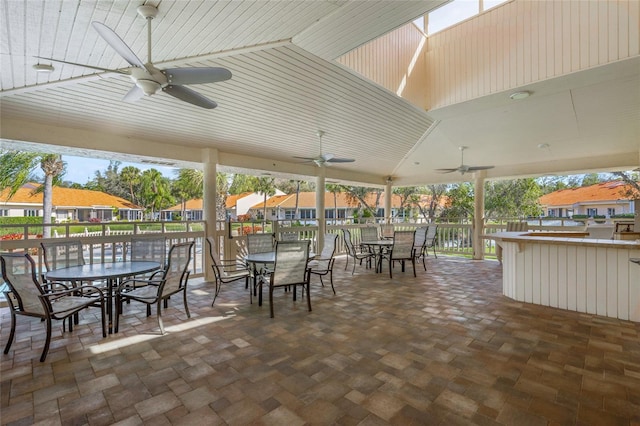 606 Marcus St Unit 26, Venice, FL 34285 - view of patio / terrace with outdoor dining space, ceiling fan, and a residential view