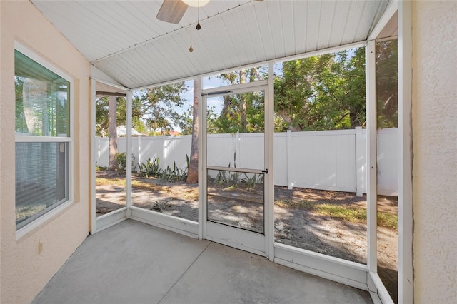 sunroom / solarium with ceiling fan