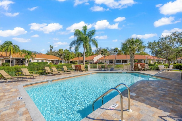 view of swimming pool featuring a patio area