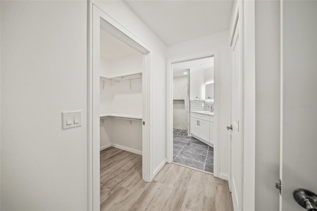 hall featuring light hardwood / wood-style floors