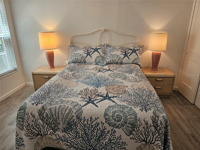 606 Marcus St Unit 26, Venice, FL 34285 - bedroom featuring wood finished floors and baseboards