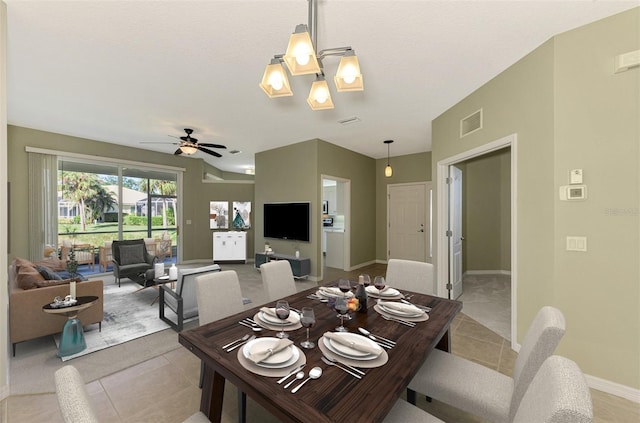 dining space featuring ceiling fan and light tile patterned flooring