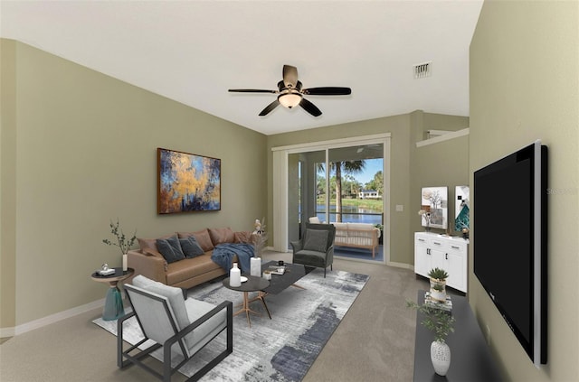 living room with ceiling fan and light carpet