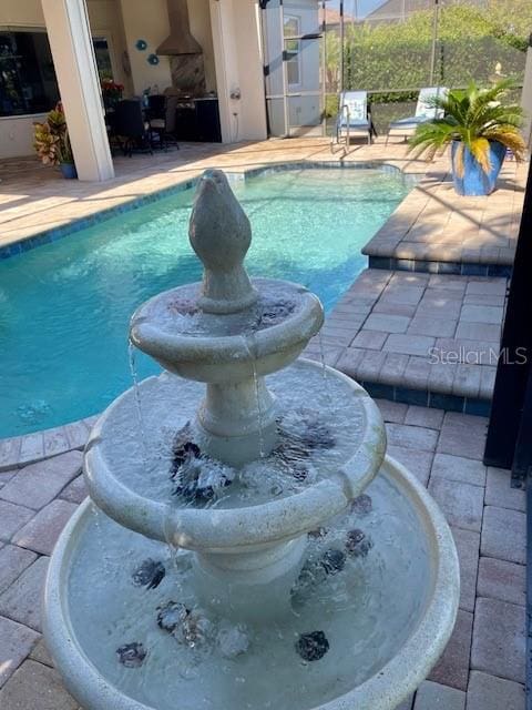 view of pool with a patio