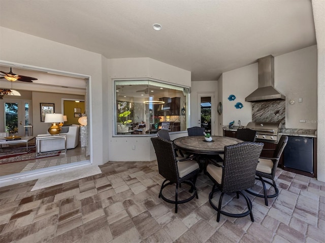 dining room featuring ceiling fan