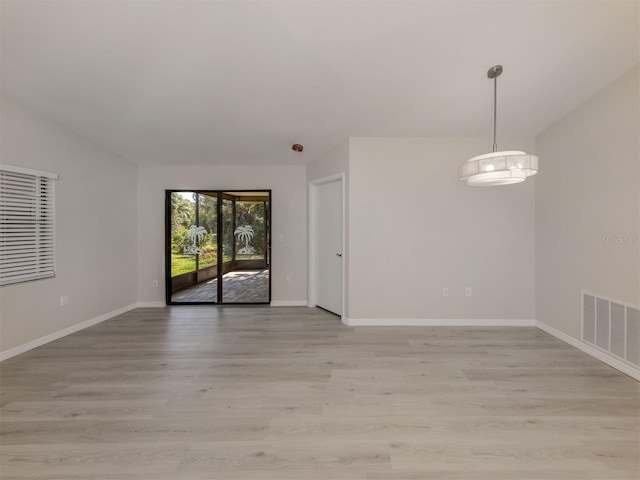 empty room featuring light wood-type flooring