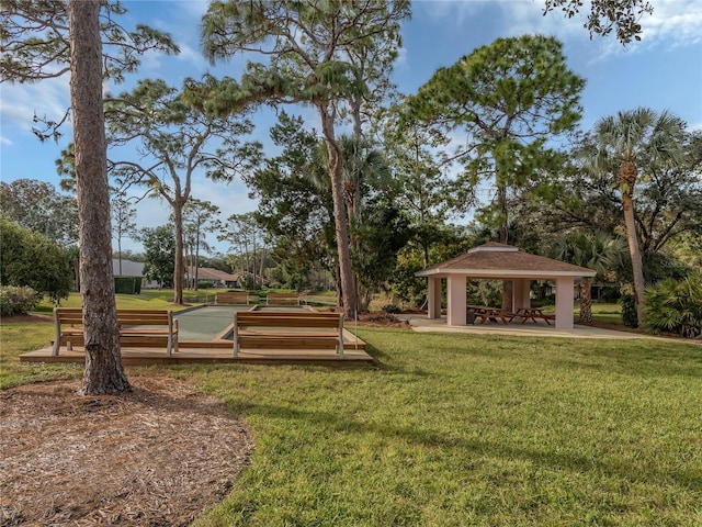 view of property's community featuring a gazebo and a yard