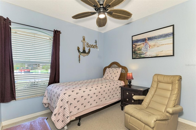 bedroom featuring ceiling fan and light colored carpet