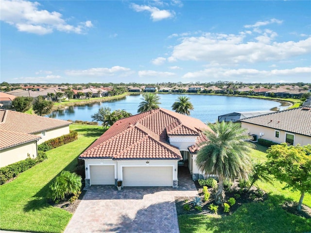 birds eye view of property featuring a water view