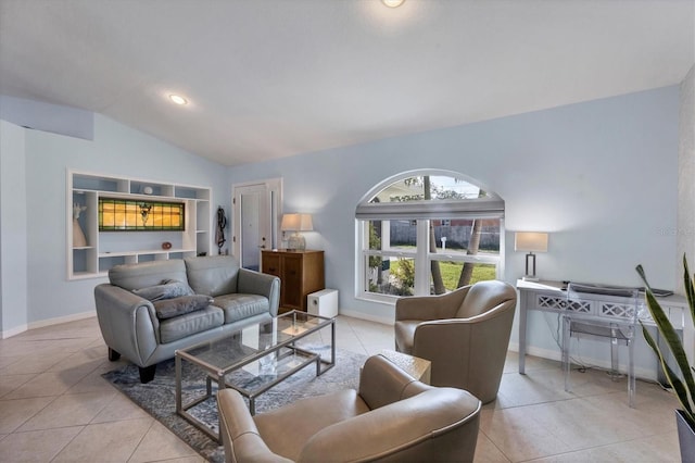 tiled living room featuring lofted ceiling