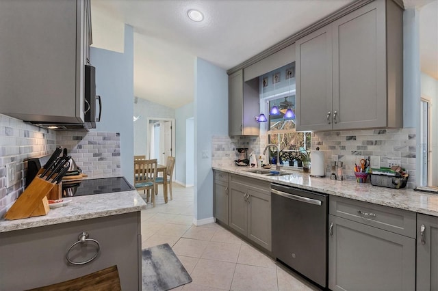 kitchen featuring tasteful backsplash, gray cabinets, sink, and stainless steel appliances