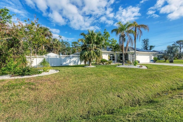 view of yard featuring a garage