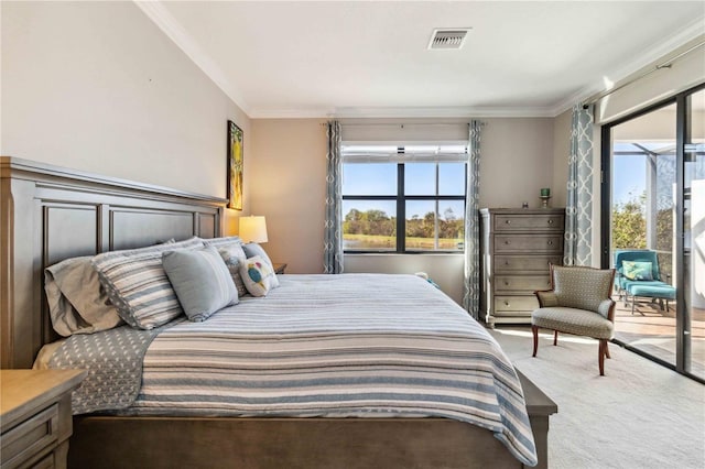 carpeted bedroom featuring access to outside and ornamental molding