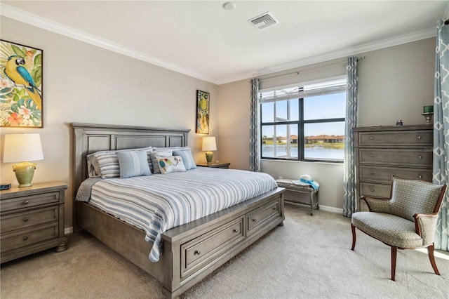 carpeted bedroom featuring a water view and ornamental molding