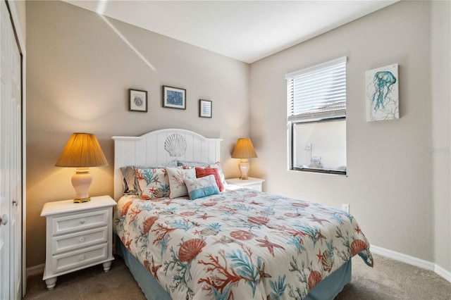 bedroom with dark carpet