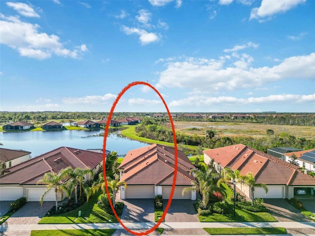 aerial view featuring a water view