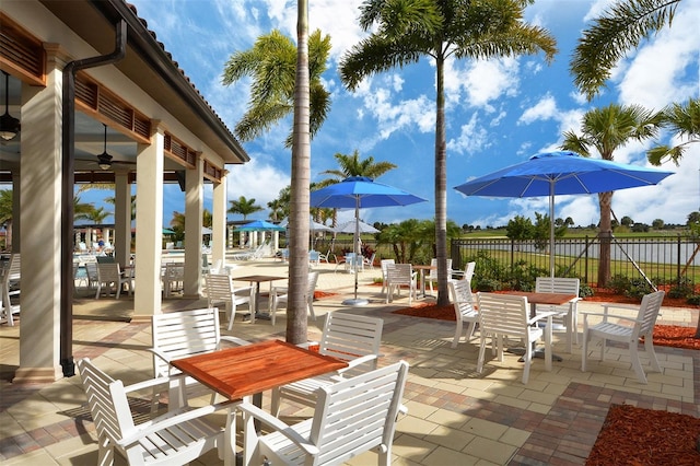 view of patio / terrace featuring ceiling fan