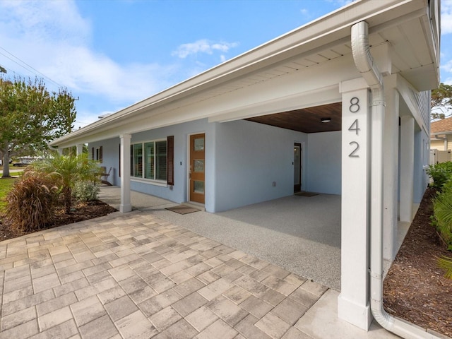 view of patio with a carport