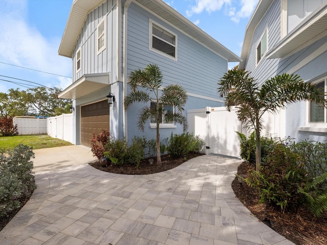 view of home's exterior with a garage