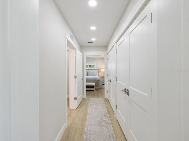 hall featuring light wood-type flooring