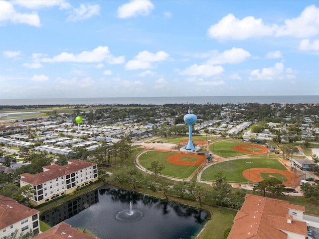 drone / aerial view with a water view