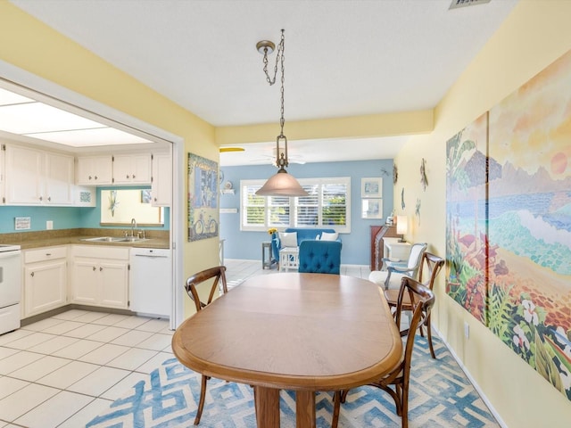 tiled dining area with sink