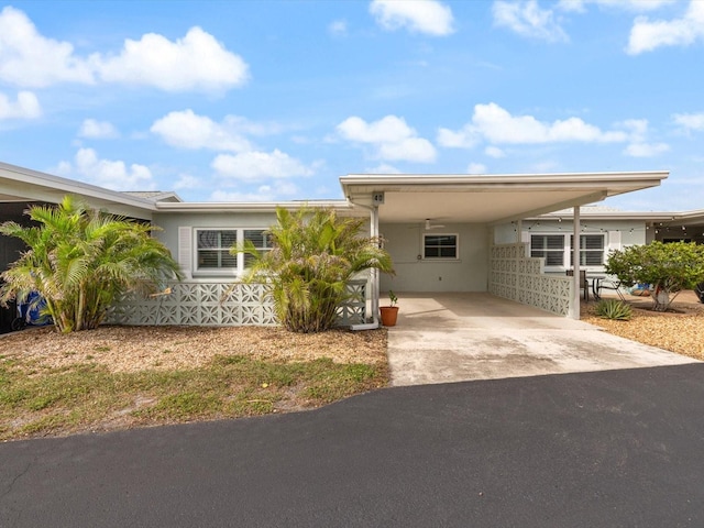 view of front of house featuring a carport