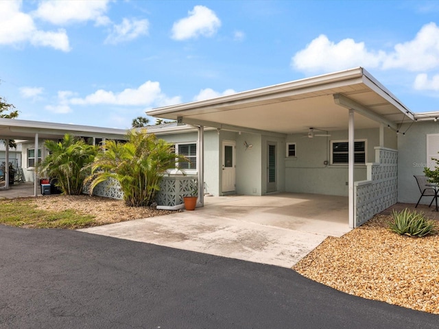 view of front facade with a carport