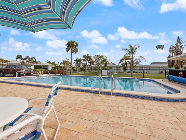 view of pool with a patio area