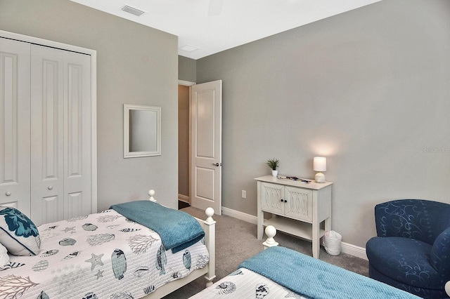 bedroom featuring carpet flooring, ceiling fan, and a closet