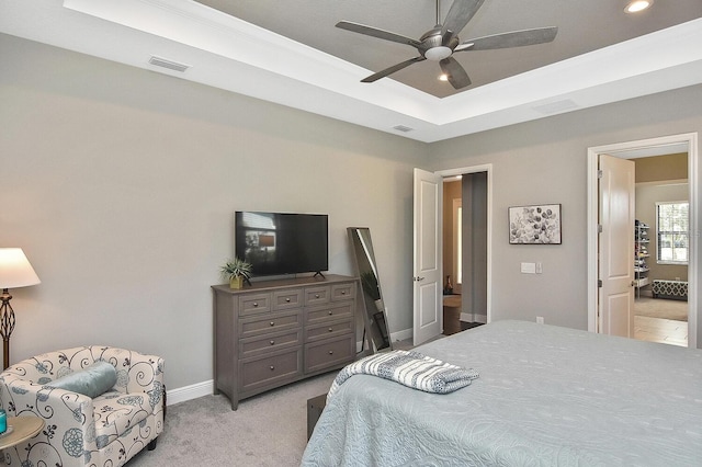 169 N Cayman Isles Blvd, Englewood, FL 34223 - bedroom featuring light colored carpet, a tray ceiling, baseboards, recessed lighting, and ceiling fan