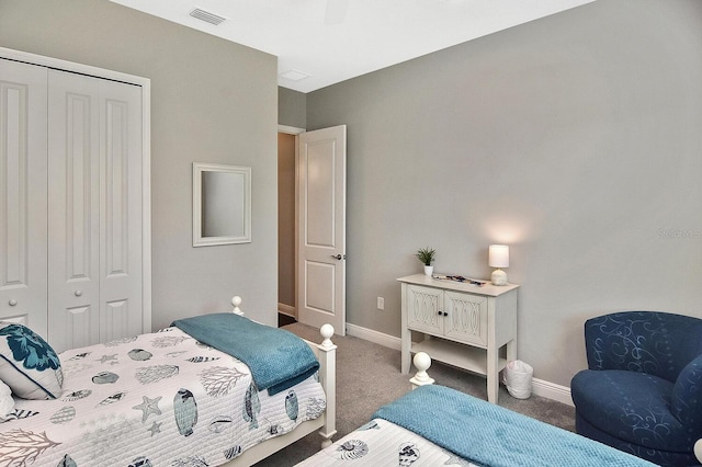 169 N Cayman Isles Blvd, Englewood, FL 34223 - bedroom with a closet, baseboards, and carpet