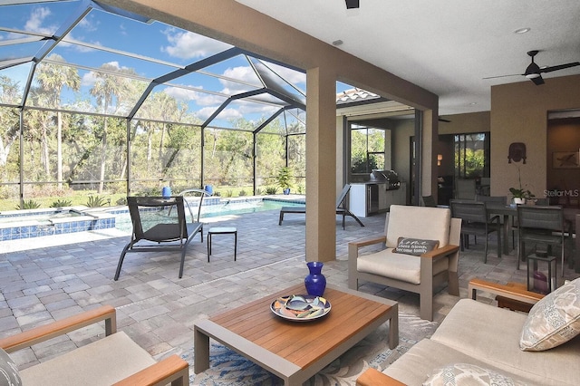 169 N Cayman Isles Blvd, Englewood, FL 34223 - view of patio / terrace featuring outdoor dining space, a ceiling fan, an in-ground hot tub, and an outdoor pool