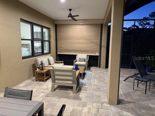 169 N Cayman Isles Blvd, Englewood, FL 34223 - view of patio with outdoor lounge area and a ceiling fan