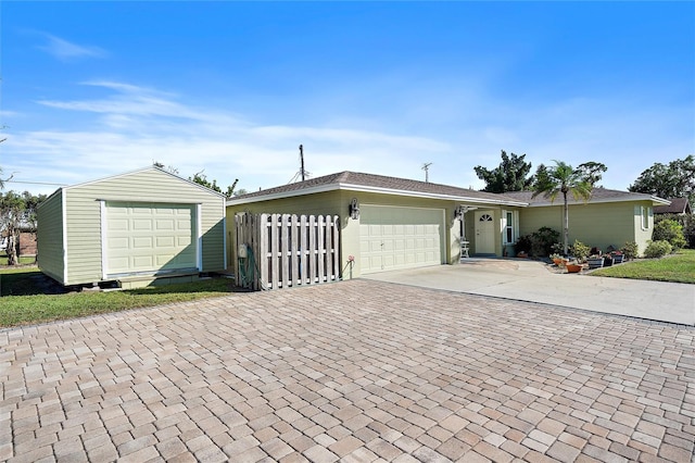 single story home with a garage