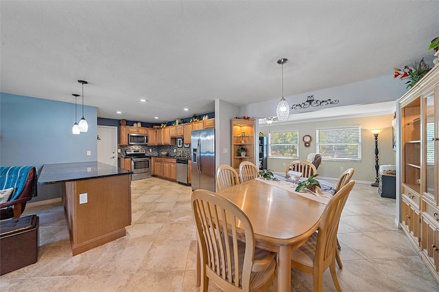 dining room featuring light tile patterned flooring