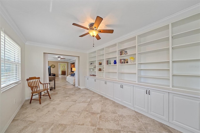 sitting room featuring built in features, ceiling fan, and crown molding