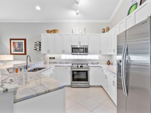 kitchen with white cabinetry, sink, and appliances with stainless steel finishes