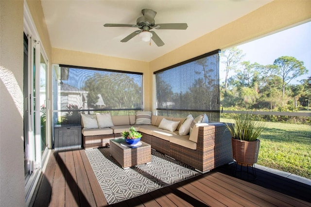 sunroom / solarium with ceiling fan